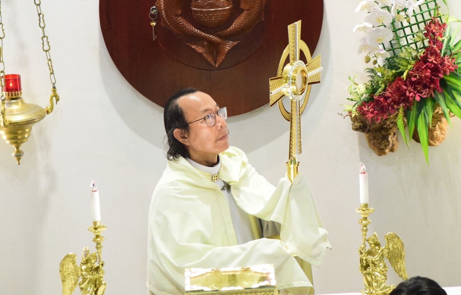 Thánh lễ Suy tôn Thánh Giá, tước hiệu của Hiệp hội Tín hữu Mến Thánh Giá giáo xứ Hiển Linh